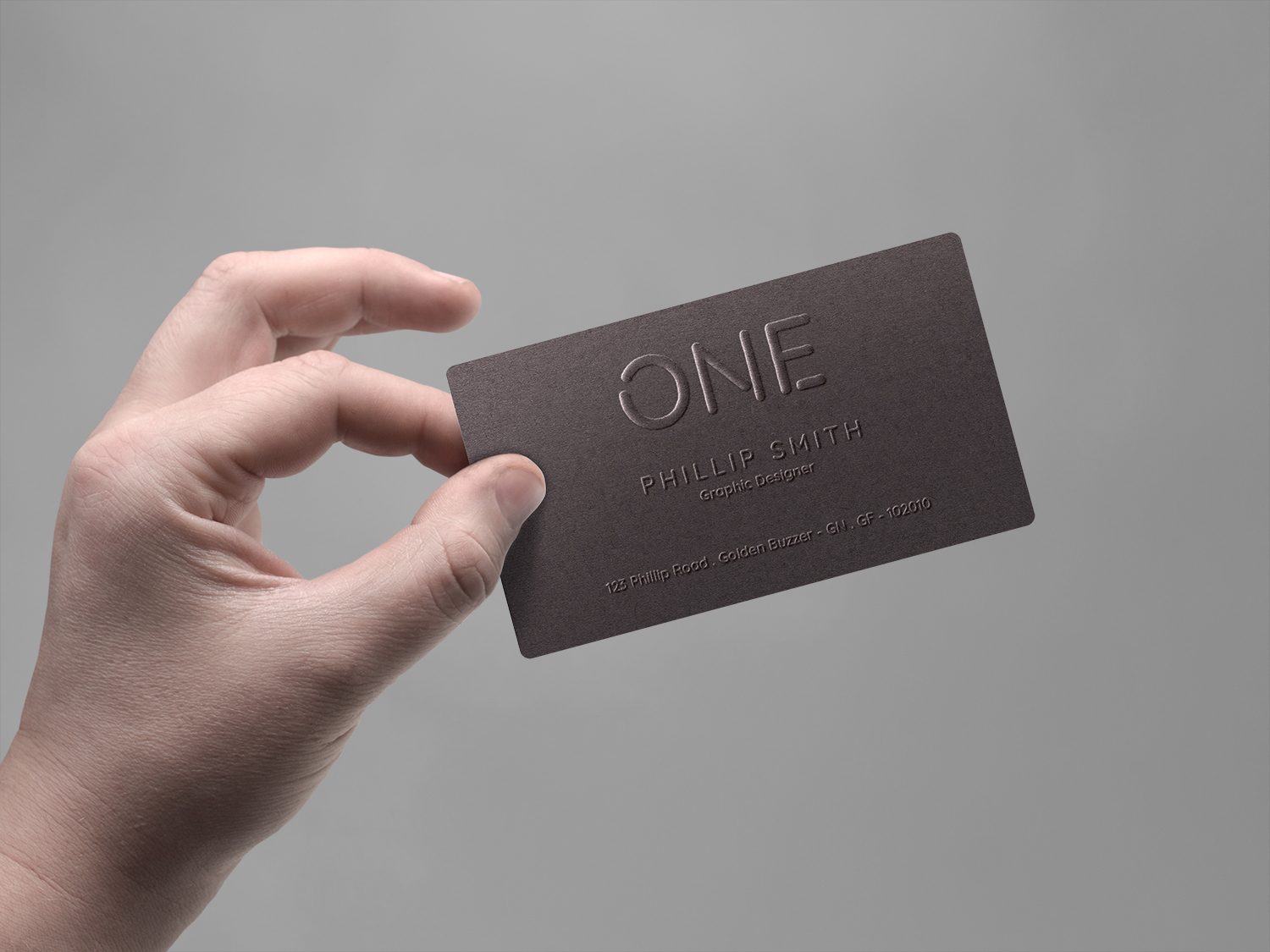 Hand Holding Business Card Mockup PSD