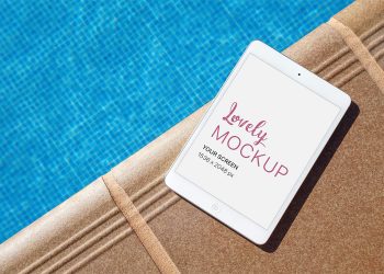 iPad near the Pool PSD Mockup