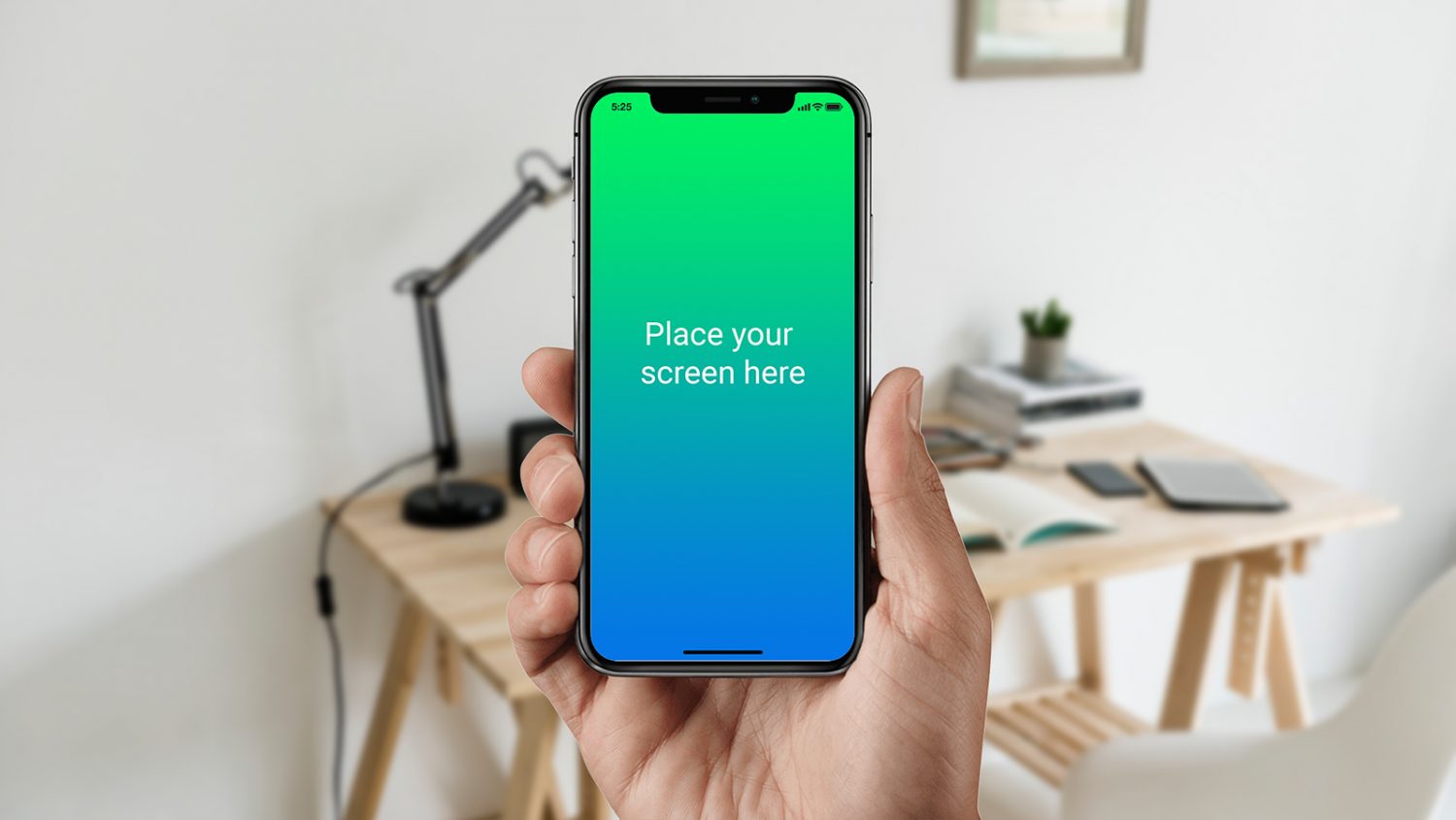 Black iPhone X in Male Hand Mockup