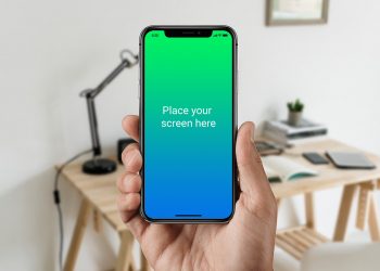 Black iPhone X in Male Hand Mockup