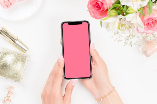 Beautiful Woman Using iPhone X Mockup