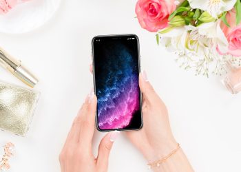 Girl Holding iPhone X Mockup