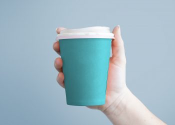 Free Paper Coffee Cup in Hand Mockup PSD