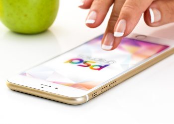 Golden iPhone with Female Hand Mockup