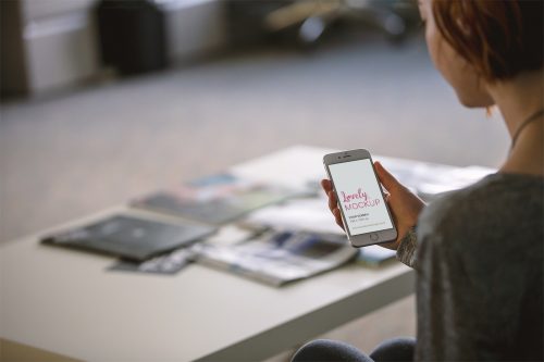 Woman Reading on iPhone Mockup