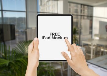 Free iPad Pro 2018 in Hand Mockup