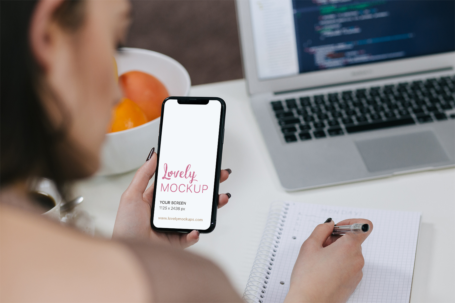 Girl Holding iPhone Mockup PSD