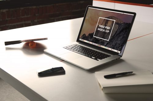 Macbook Pro on Table Mockup