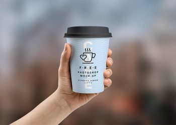 Free Medium and Small Cup in Hand Mockup PSD