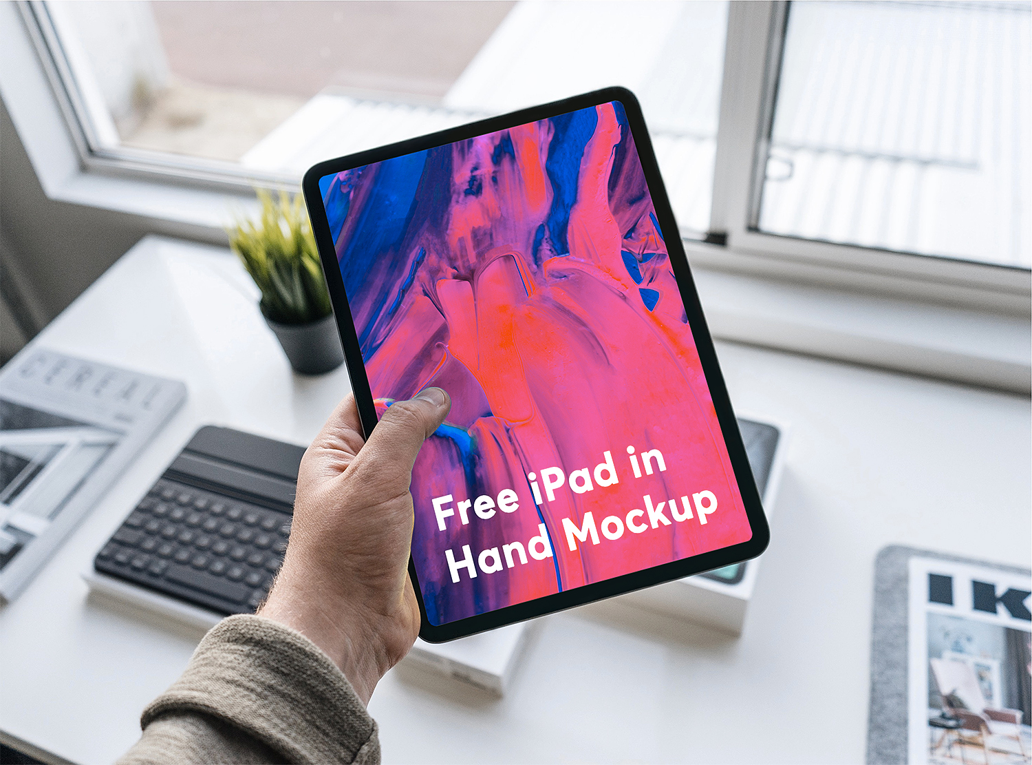 Free iPad Pro 2018 in Hand Mockup
