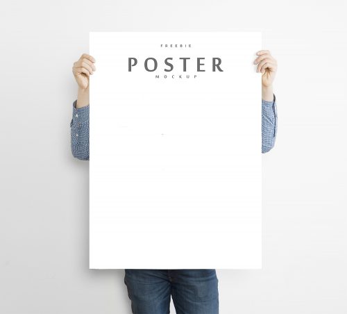 Man Holding Poster Mockup