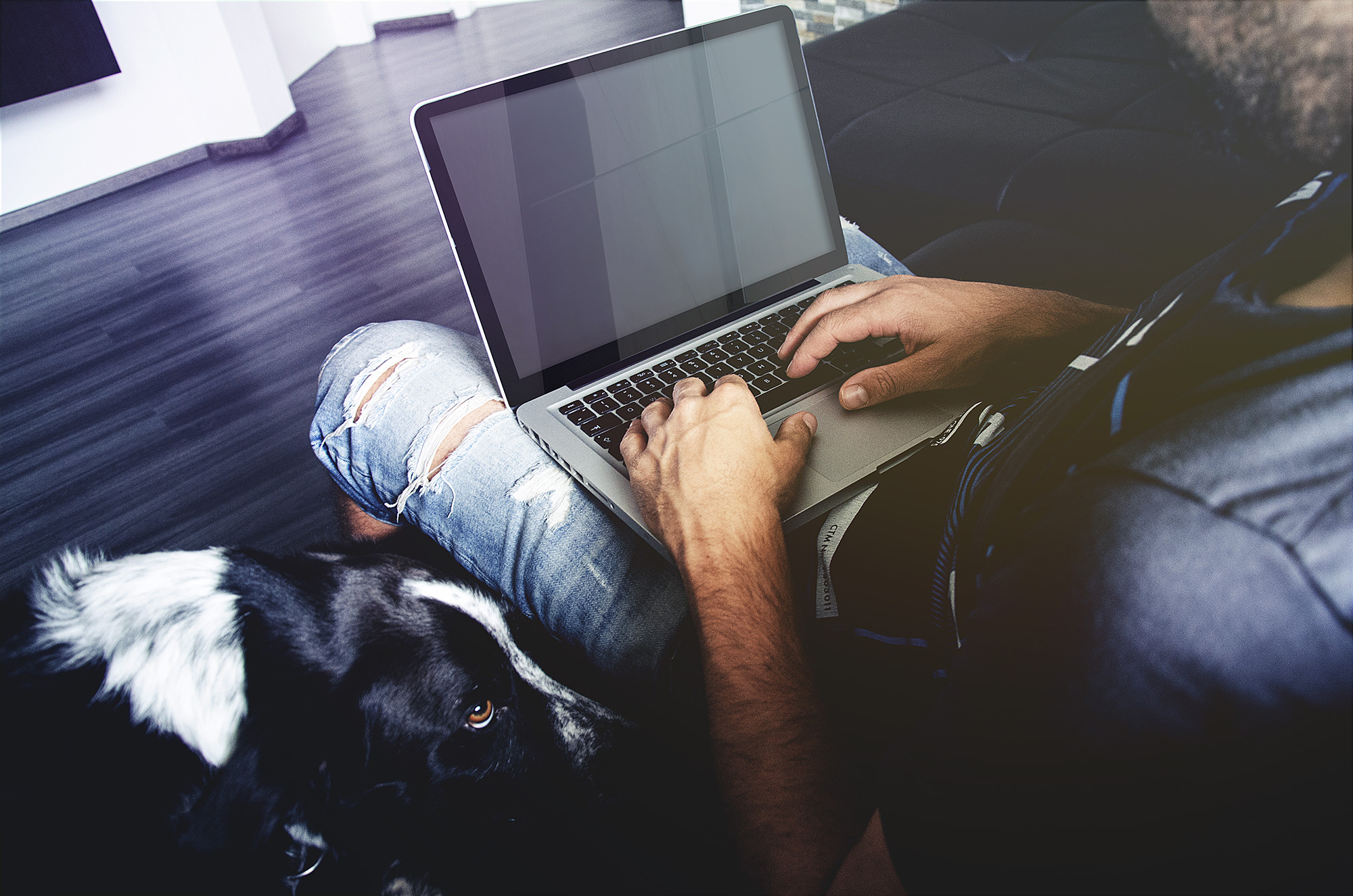 Man Working on a MacBook Pro Mockup