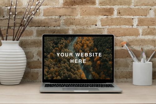 Realistic MacBook Workspace Mockup