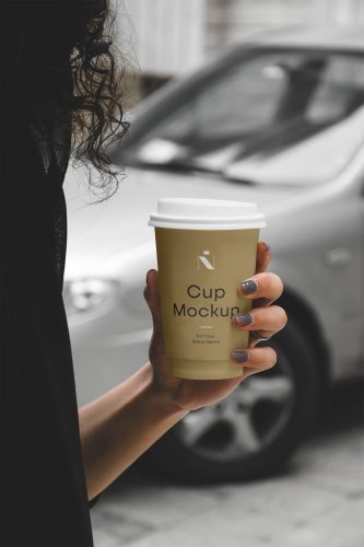 Woman Holding Coffee Cup Mockup