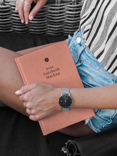 Hand Holding Notebook Mockup