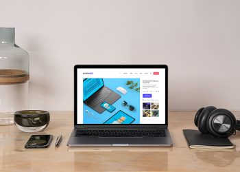 MacBook Pro Mockup on a Desk Workspace Scene