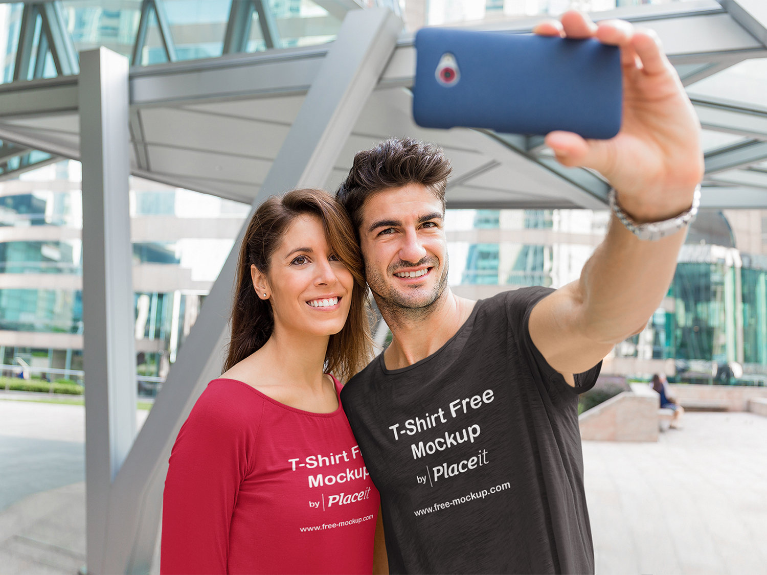 Free Round Neck T-Shirt Mockup of a Couple Taking a Selfie