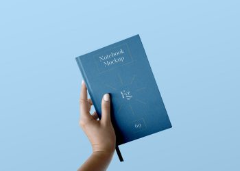 Hard Cover Notebook with Hand Mockup