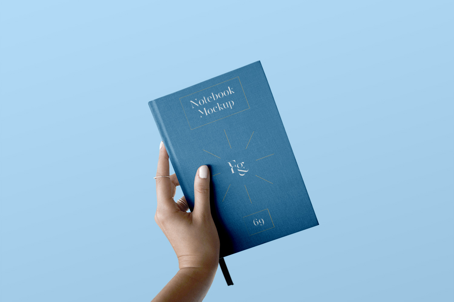 Hard Cover Notebook with Hand Mockup