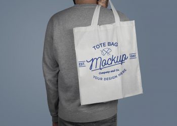 Model Holding a Tote Bag on His Back Free Mockup