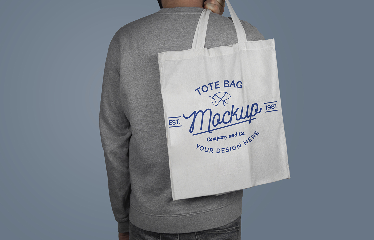 Model Holding a Tote Bag on His Back Free Mockup
