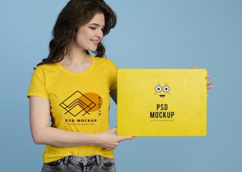 Person with Excited Expression Holding Poster Free Mockup