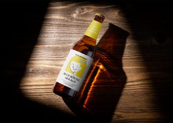 Beer Bottle on Wooden Background Mockup