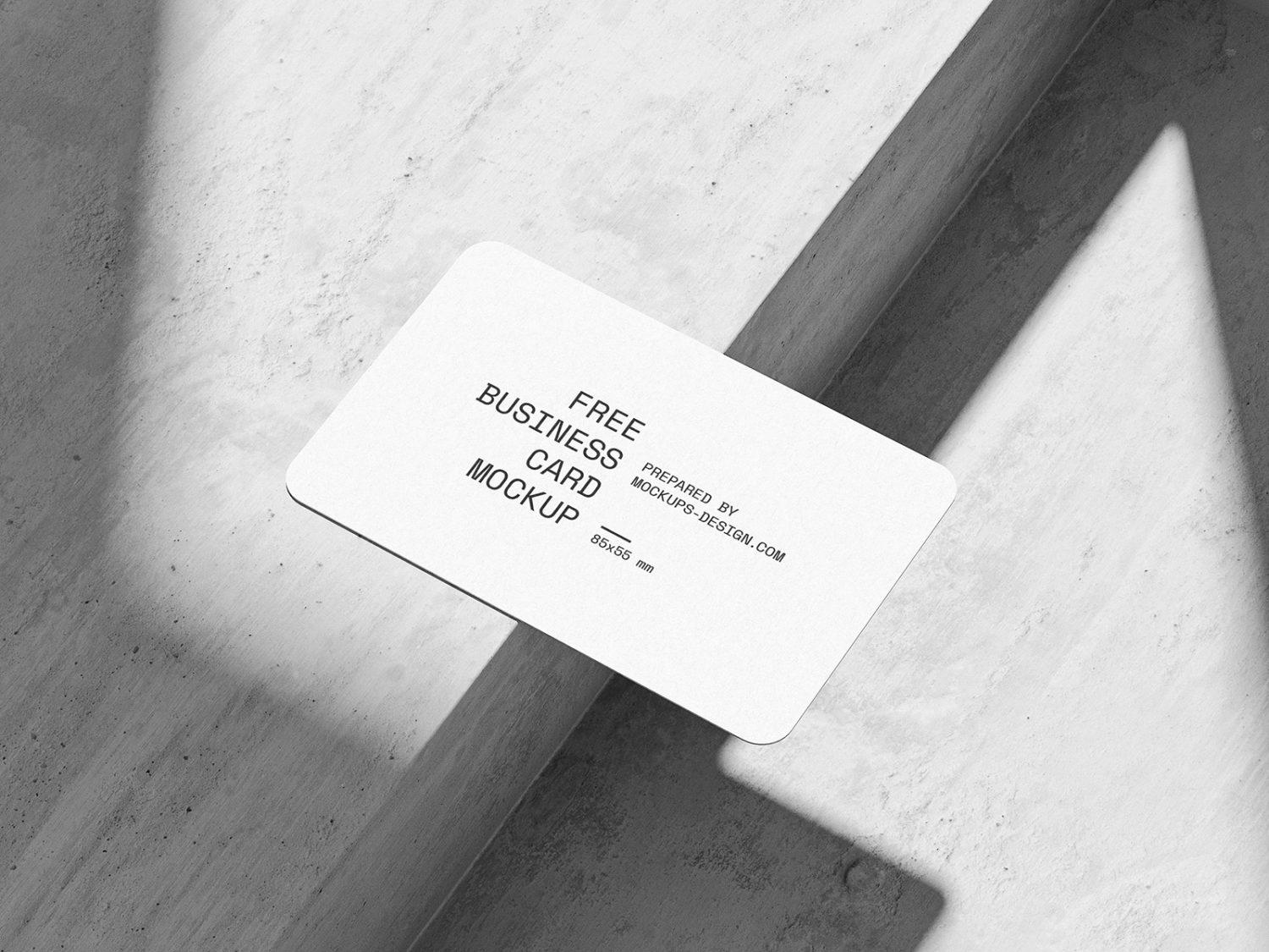 Rounded Business Card on Concrete Mockup