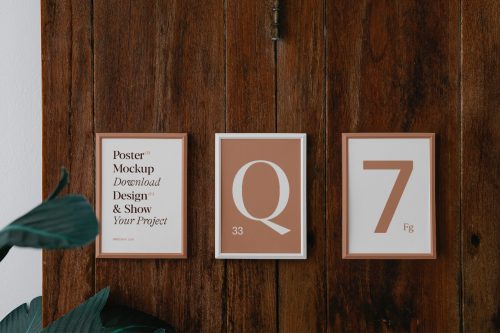 Three Posters on Wood Wall Mockup