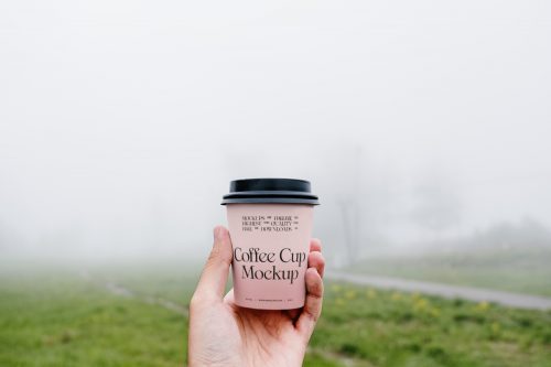 Coffee Cup in Park Mockup