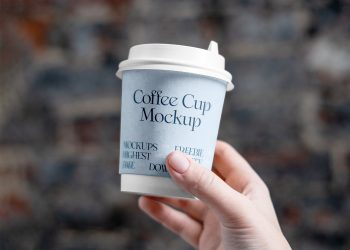 Coffee Cup in Hand Free Mockup