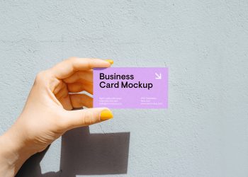 Business Card in Women Hand Free Mockup