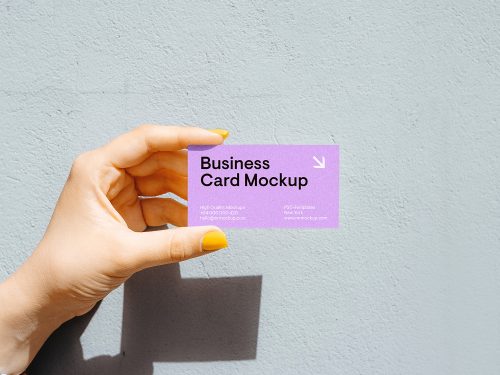 Business Card in Women Hand Free Mockup