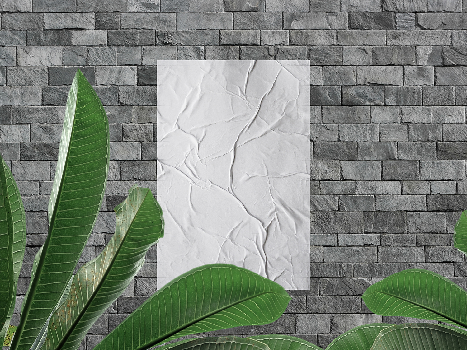 Free Modern Glued Poster on Stone Bricks Wall Mockup