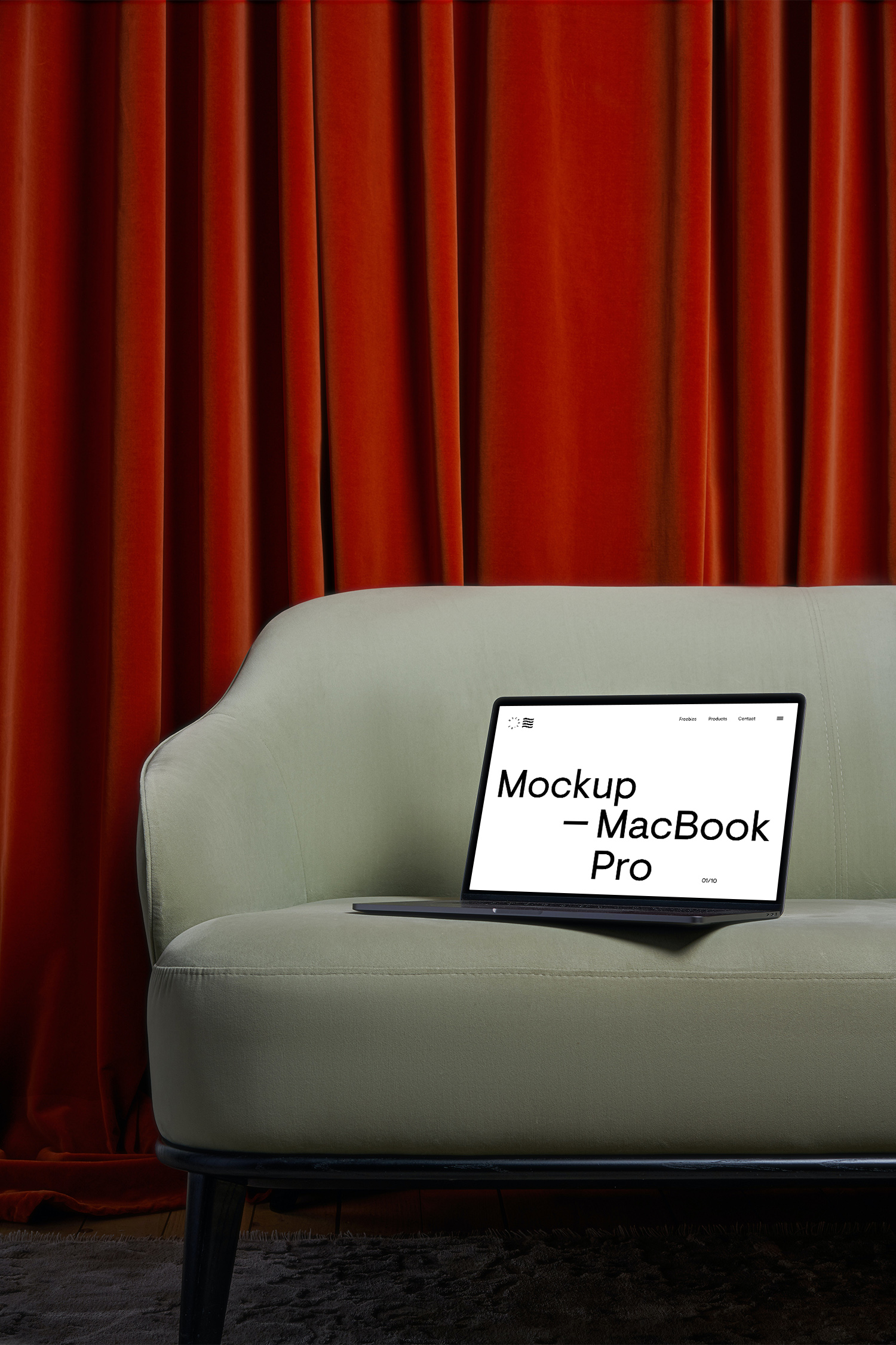 MacBook Pro Free Mockup on a Sofa