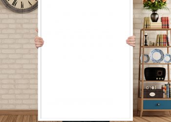 Free Man Holding Poster Mockup