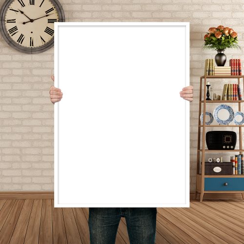 Free Man Holding Poster Mockup