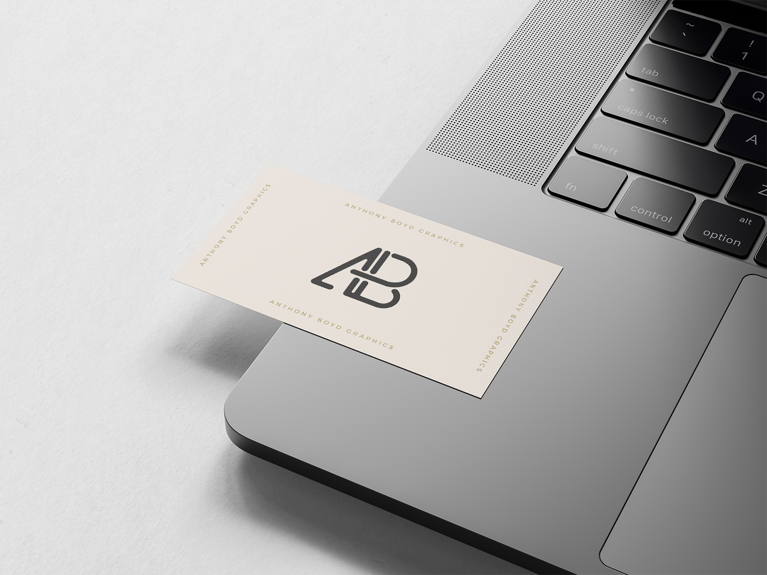 Business Card on MacBook Pro Free Mockup