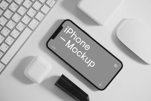 iPhone with Accessories Free Mockup