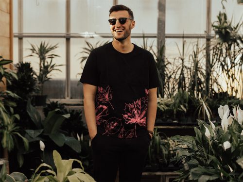 Smiling Man in Black T-Shirt Free Mockup