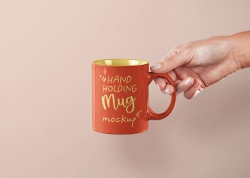 Hand Holding Mug Free Mockup