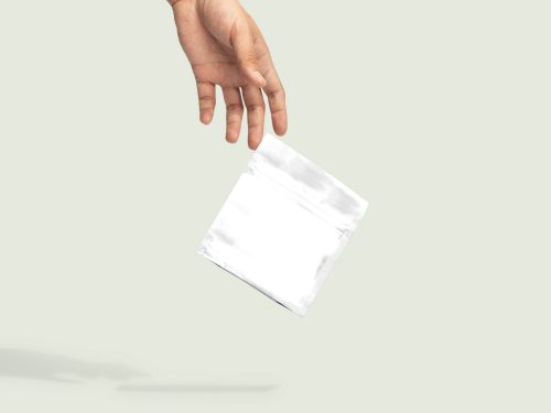 Hand Dropping Paper Bag Free Mockup