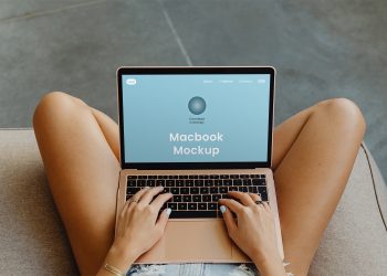 MacBook on Legs Free Mockup