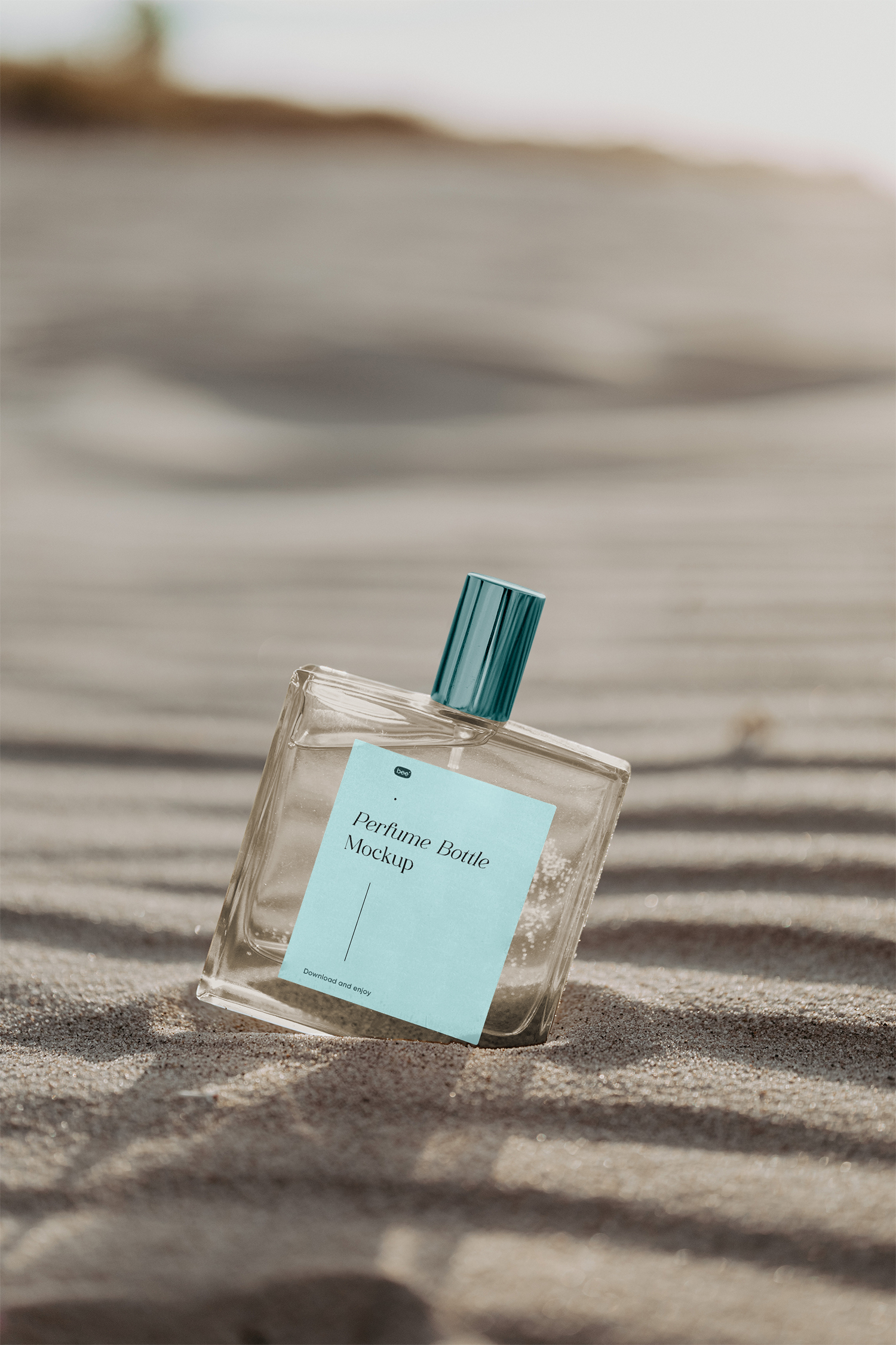 Transparent Bottle on Sunny Beach Free Mockup