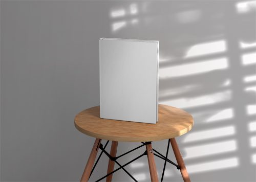 Hardcover Book on Wooden Stool Free Mockup