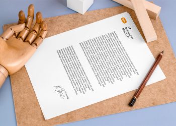 Letterhead with Wooden Hand Free Mockup