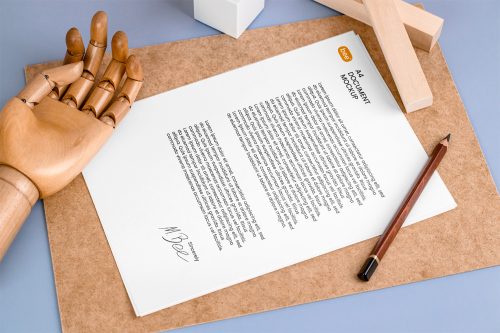 Letterhead with Wooden Hand Free Mockup