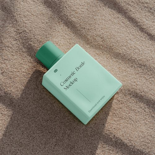 Square Bottle on Beach Free Mockup