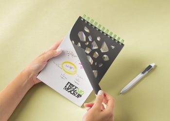 Hands Holding Spiral Notebook Free Mockup