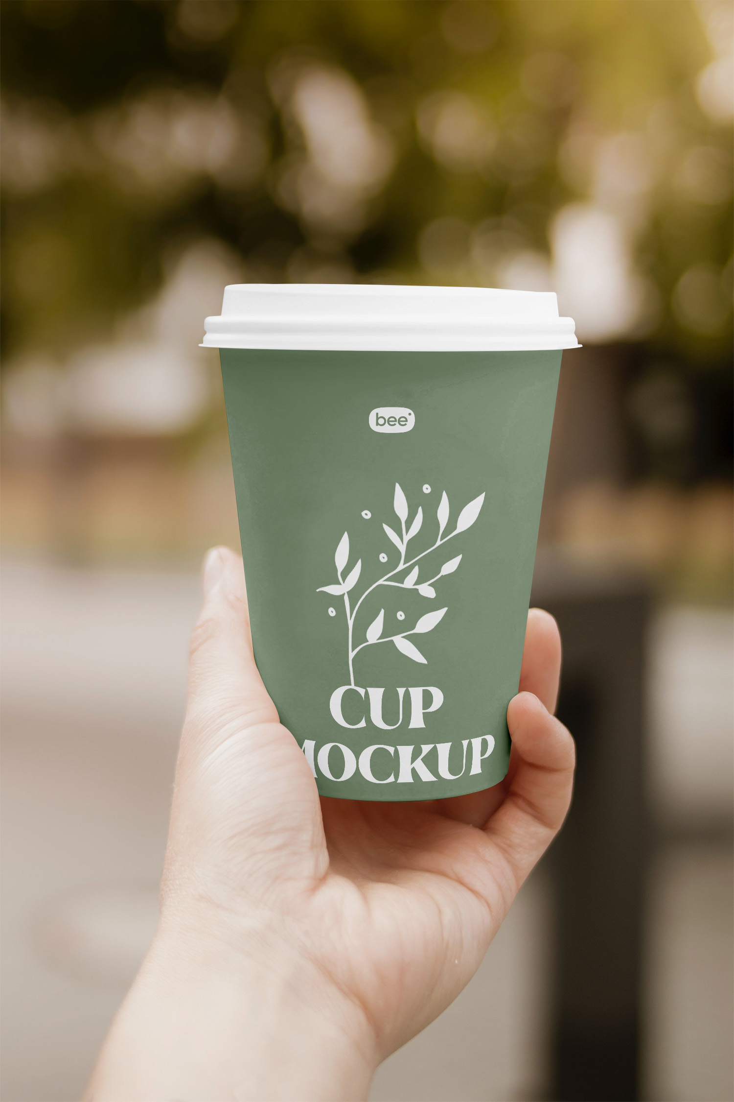 Paper Cup in Hand Free Mockup